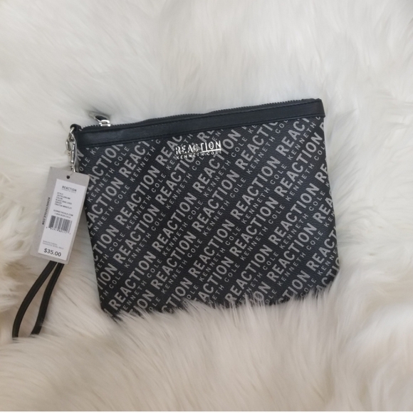 Kenneth Cole Reaction Handbags - Kenneth Cole wristlet.